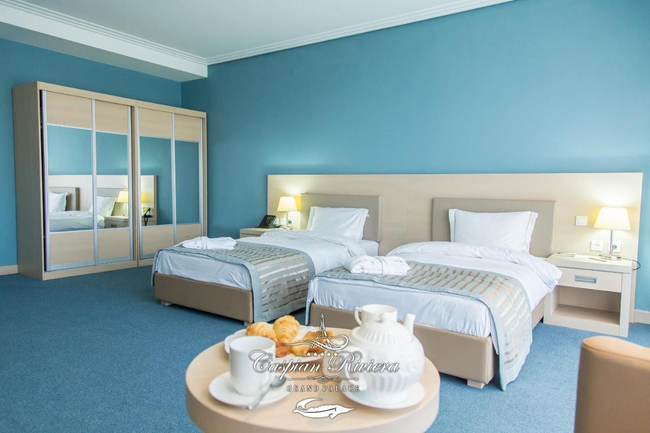 Caspian Riviera Grand Palace Hotel 악타우 외부 사진 A room at the hotel
