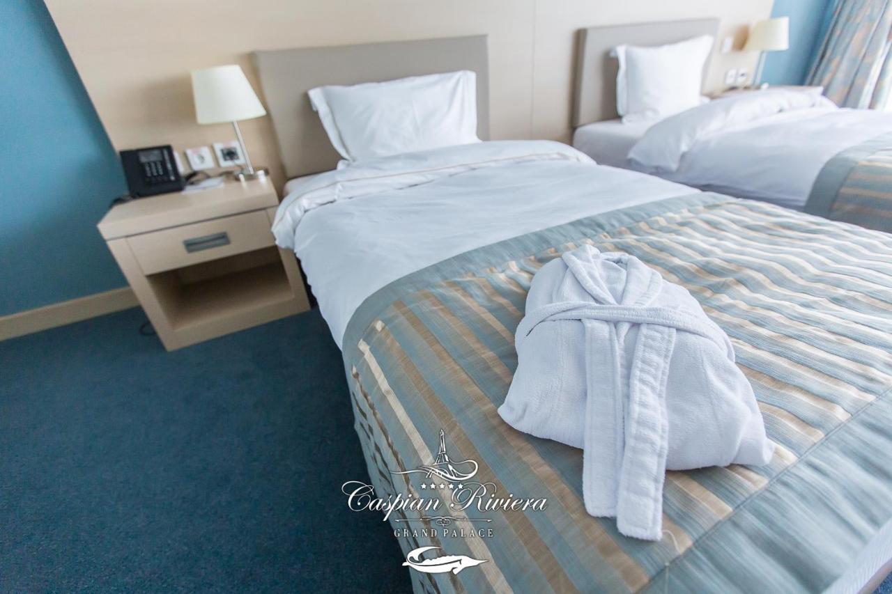 Caspian Riviera Grand Palace Hotel 악타우 외부 사진 A room at the hotel